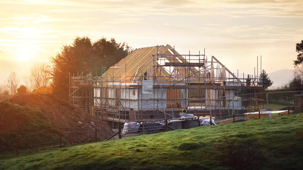 new build home under construction early morning sunrise countryside