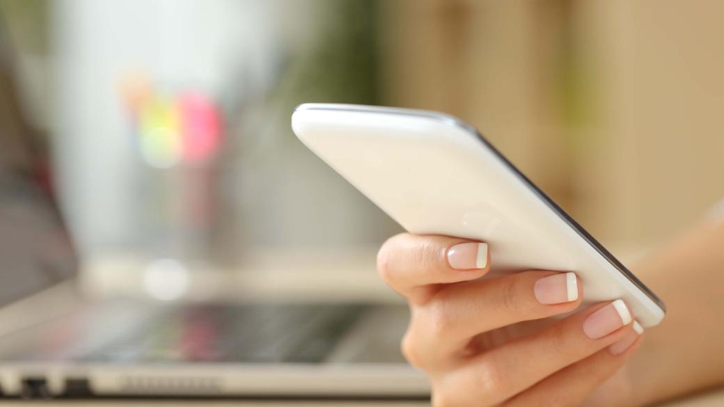 contact us mobile phone in hand