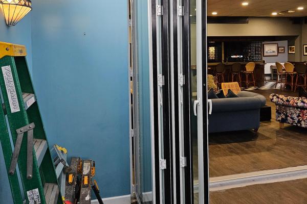 Burgun Contractors installing large bifold doors