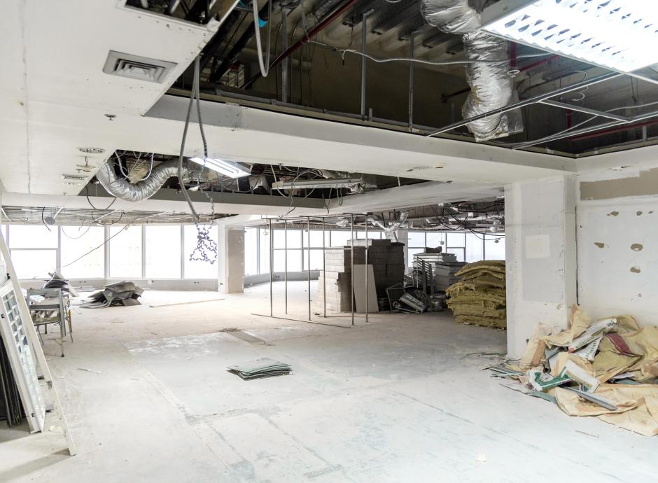 Large room under renovation or under construction.