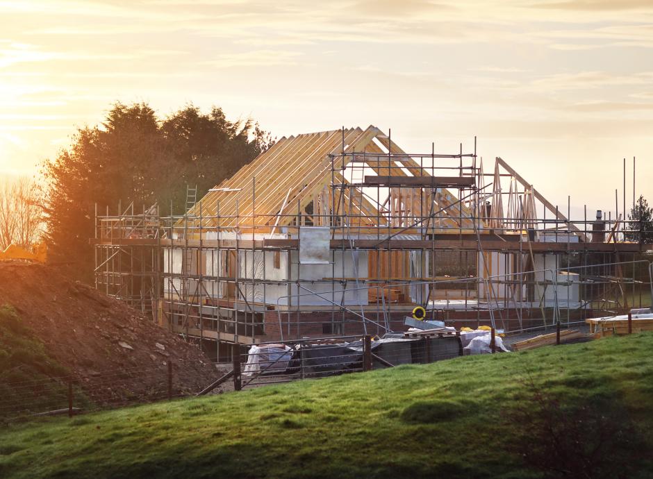new build home under construction early morning sunrise countryside