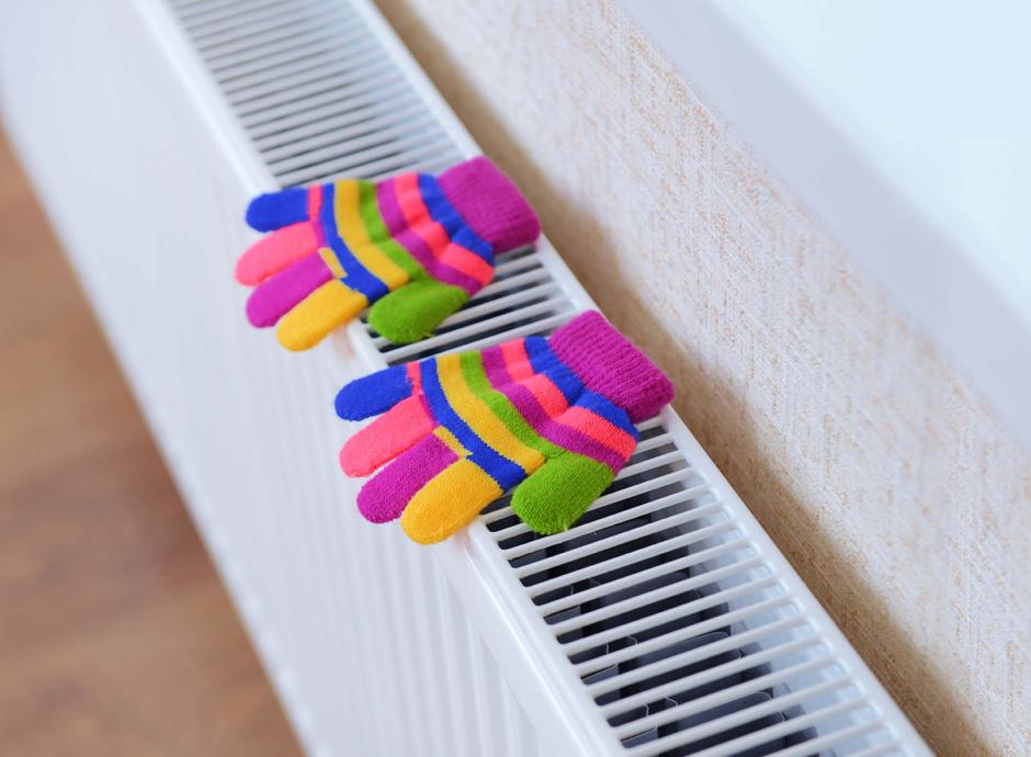 kids gloves on radiator